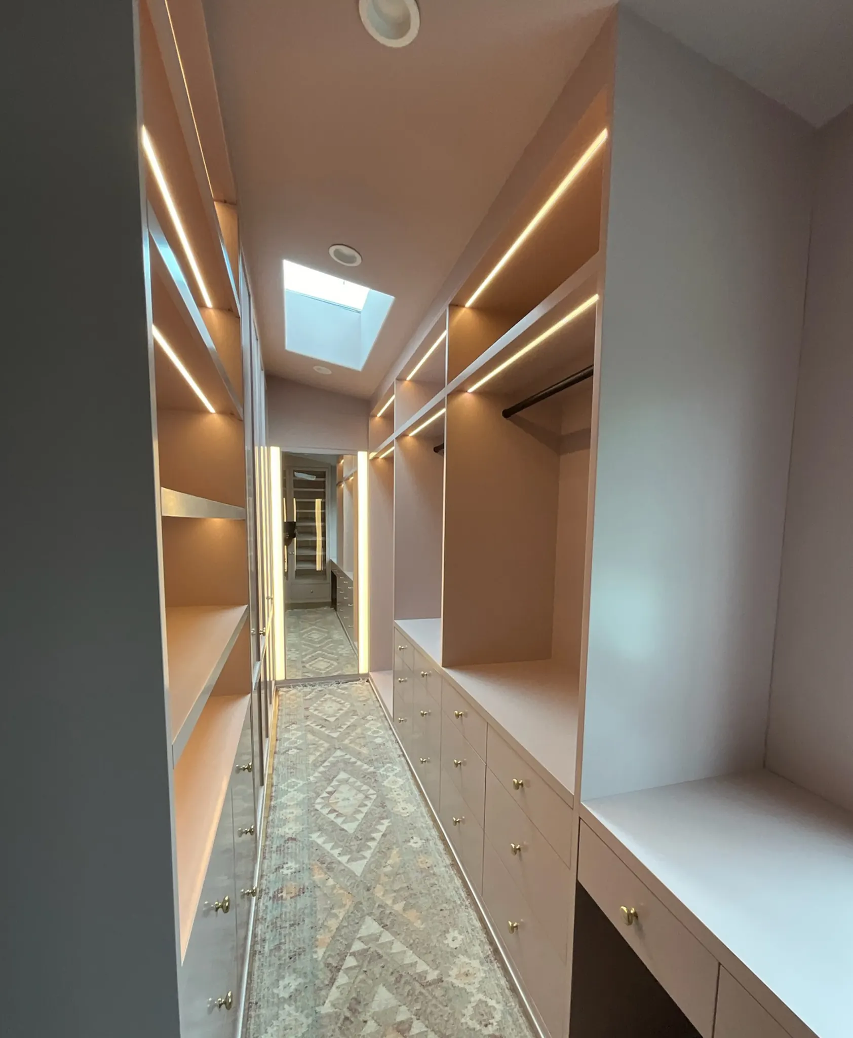 Painted Walk-In Closet with Strip Lighting